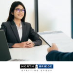 A job applicant sits confidently in a high-stakes job interview.