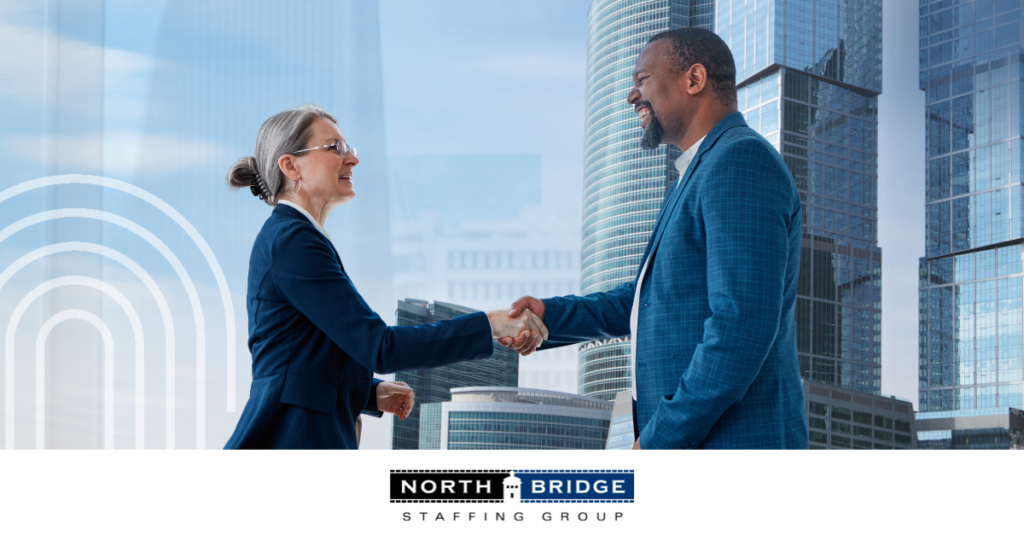 An organization leader shakes hands to seal the deal with a recruiting partner
