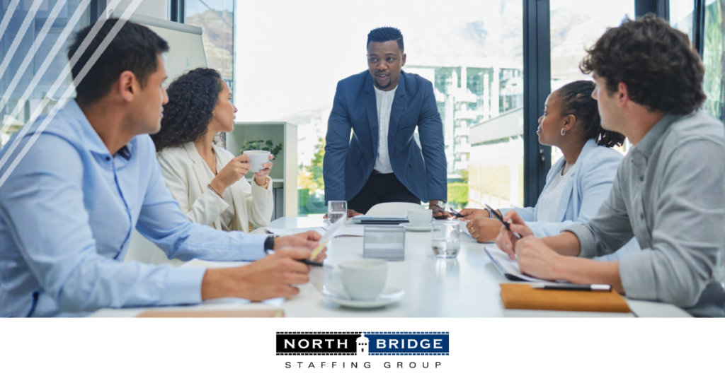Recruitment team holding a meeting for strategic hiring planning