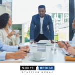 Recruitment team holding a meeting for strategic hiring planning