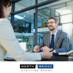 Job applicant in an interview with a professional in corporate attire