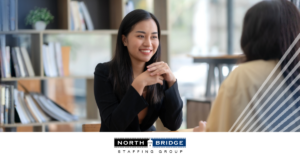 A candidate undergoes an interview with a recruiter, illustrating candidate vetting vs hiring speed