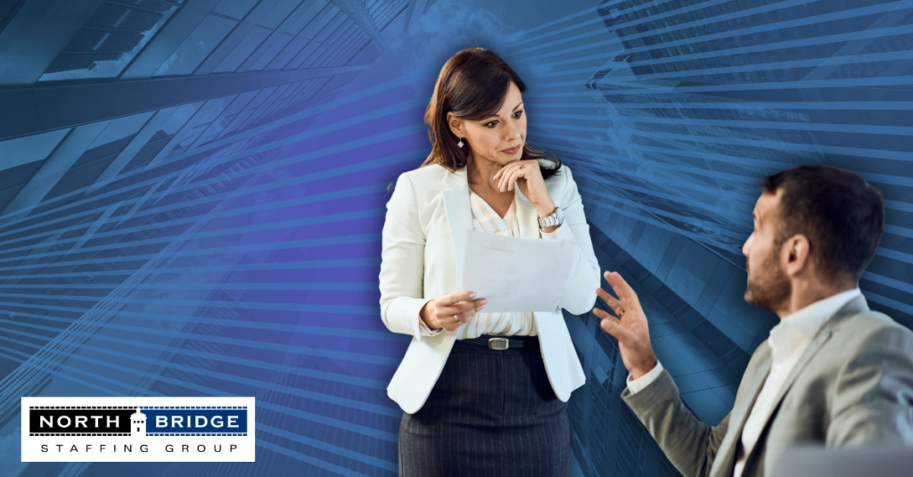 A recruiter speaks with a candidate, carefully matching him with the right role.