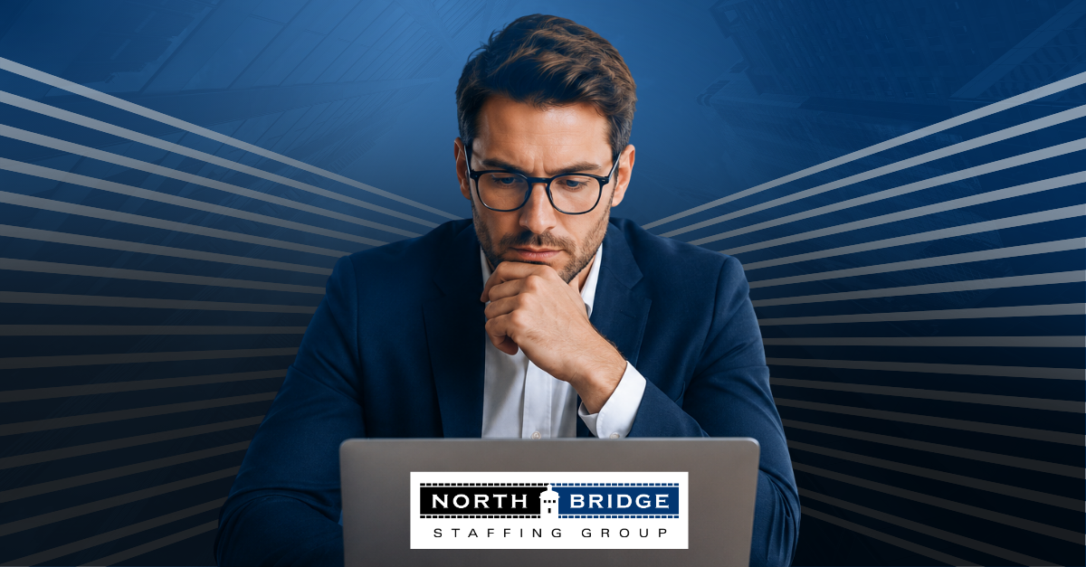 A professional sits facing a laptop, lost in thought about whether the recruiter relationship is over or on pause.