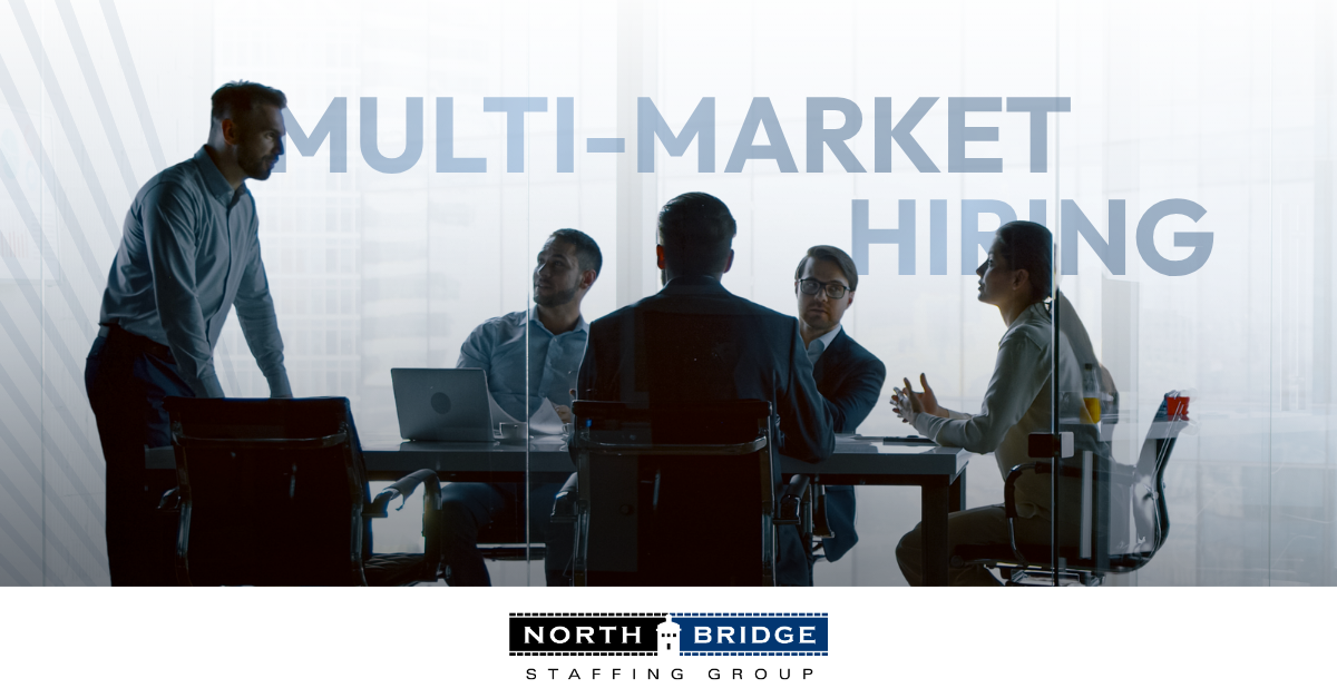 Recruiting team discussing multi-market hiring strategy in meeting