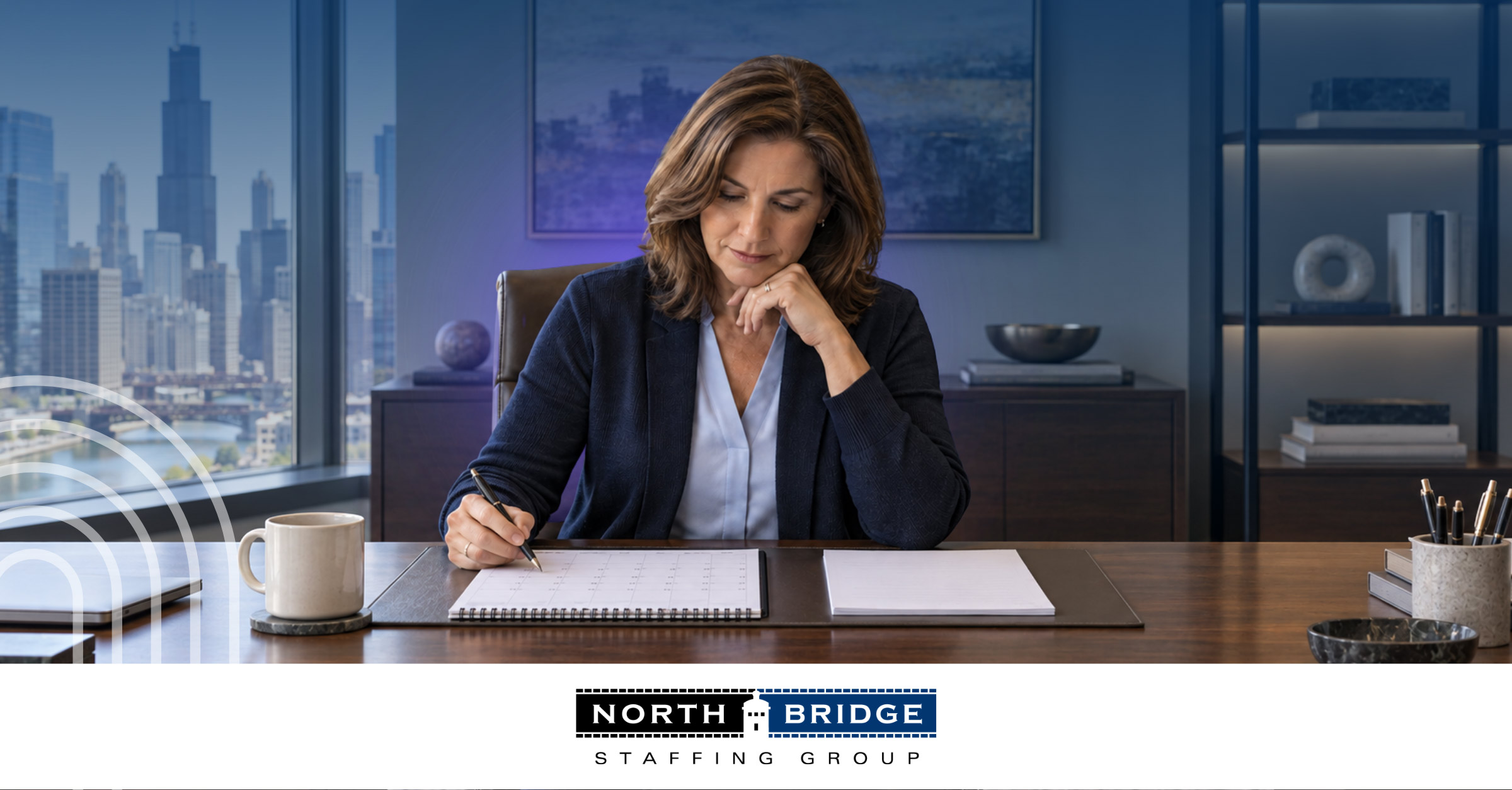 A professional woman writes in a planner at her desk in an office overlooking a city skyline. North Bridge Staffing Group logo.
